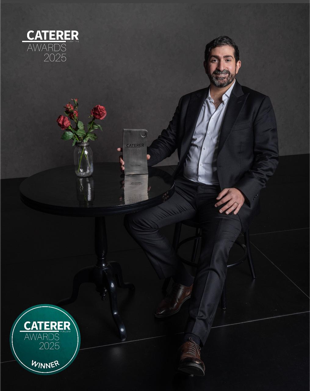 Pinch Gourmet receiving the Caterer Middle East Award